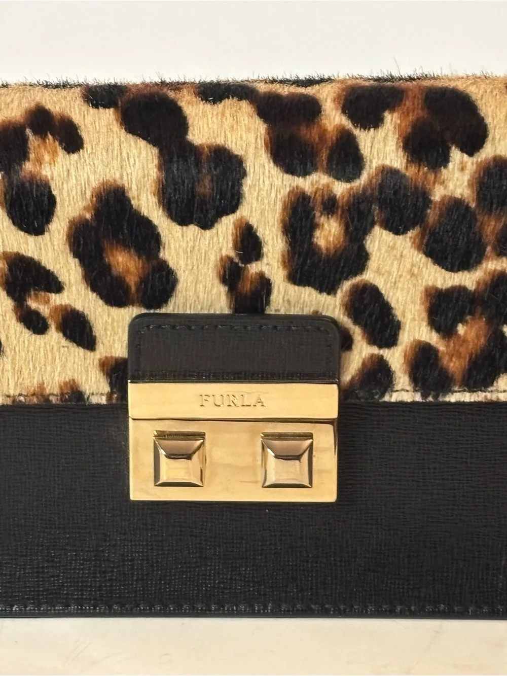 Furla Bella mini crossbody with leopard print calf hair and leather. Adjustable